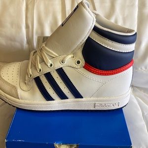 Boys high top Adidas’s, white w/blue stripes and blue and red accents on back